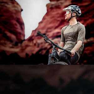 Mountain biker wearing Rudy Project Protera+ helmet with sun protective visor mobile view