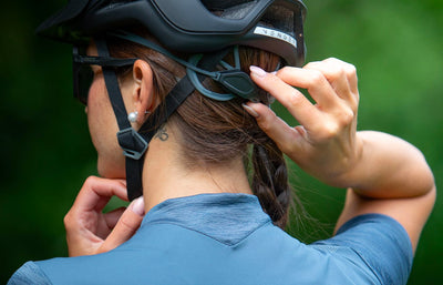 Rudy Project RSR 10 Retention System used by woman wearing bicycle helmet