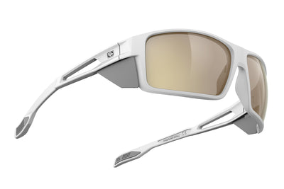 Rudy Project Nyad sport sunglasses are perfect for all outdoor activities including running, cycling, gravel biking, mountain biking, golf and pickleball and they're prescription ready#color_nyad-white-matte-frame-with-impactx-photochromic-2-laser-crimson-lenses
